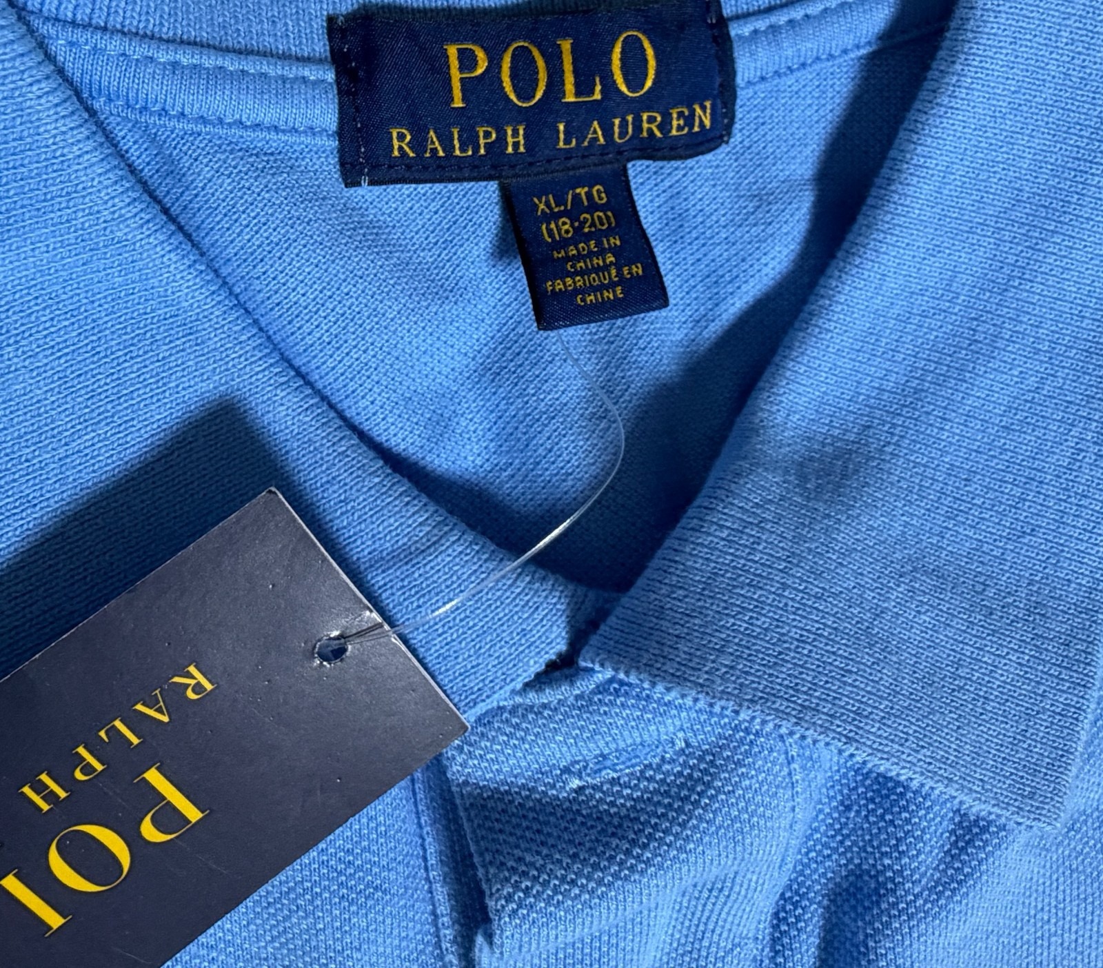 Blue Polo Ralph Lauren shirt — Size label and tag close-up